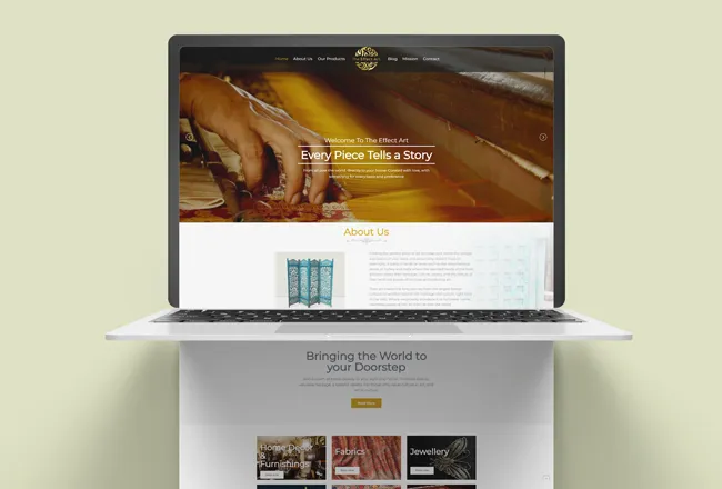 The Effect Art antiques website homepage on a laptop